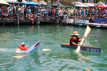 schooner wharf bar minimal regatta contest people in the water in their boats.